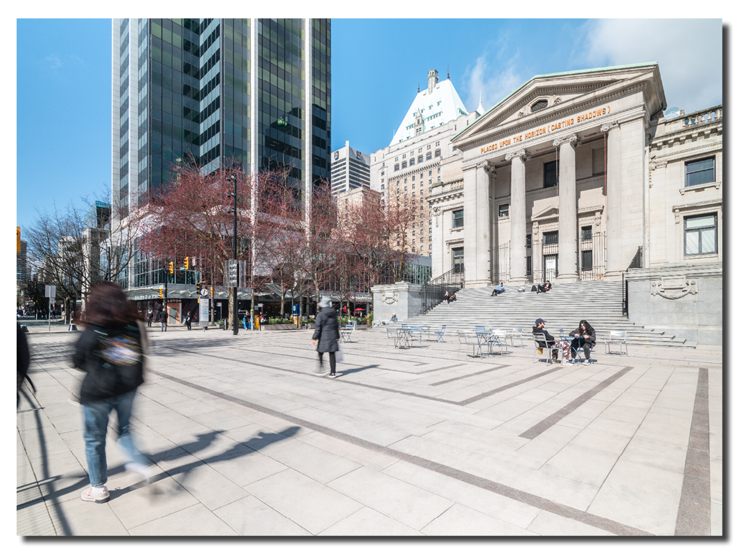 People walking through 800 Bock area at Robson Square