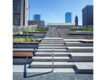 Main stairs aligning with the bridge to the raised walkways. Lighting is conceal