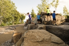 In addition to mediating the elevation change between the upper and lower park, the Bluff promotes unstructured play.