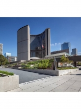 The concrete thresholds with stainless steel letters announce the entry into the