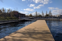 A floating dock offers waterfront access at the north entrance of the park. The accessible washroom building adjacent.