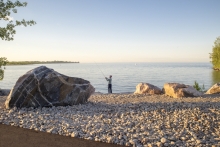 In Bonfire Bay adjacent the Pavilion, a pebble beach along the water's edge holds erratic northern Ontario bluff boulders.